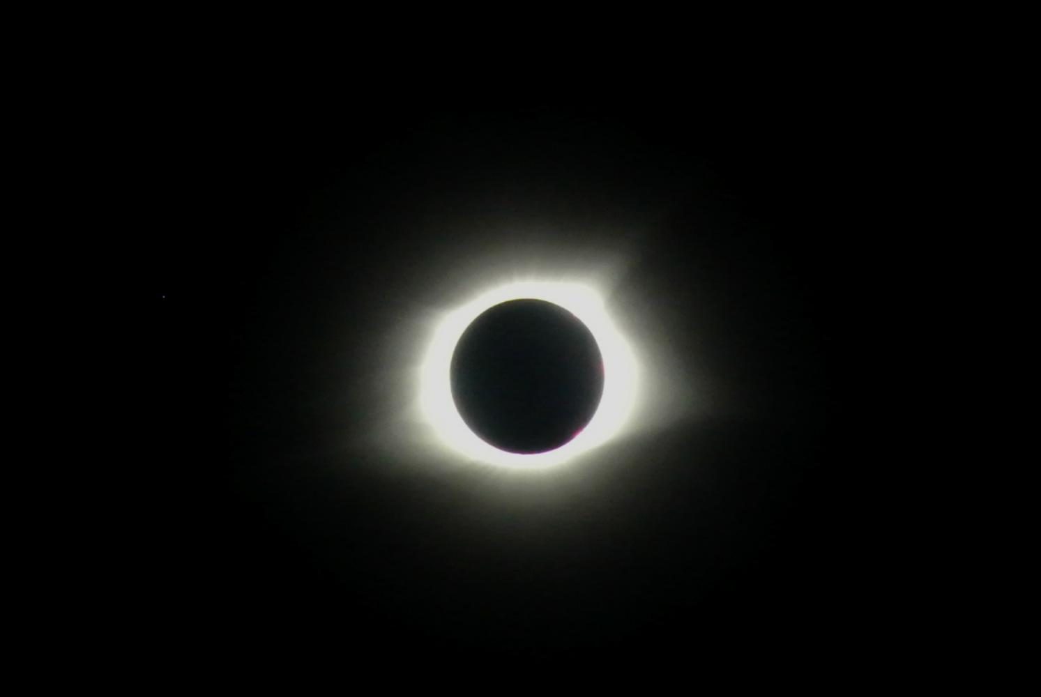  The total solar eclipse in reached totality at 1:21 p.m. and lasted for two minutes and forty seconds in Carbondale, IL.