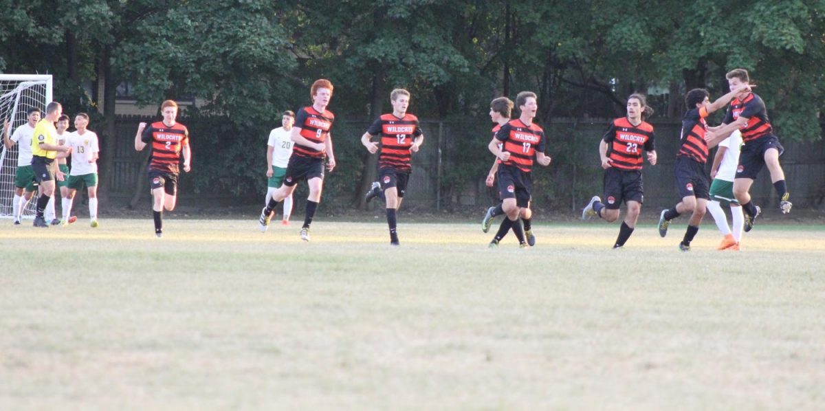 Libertyville players celebrate, after a goal by Greg Krokorian in the second half.