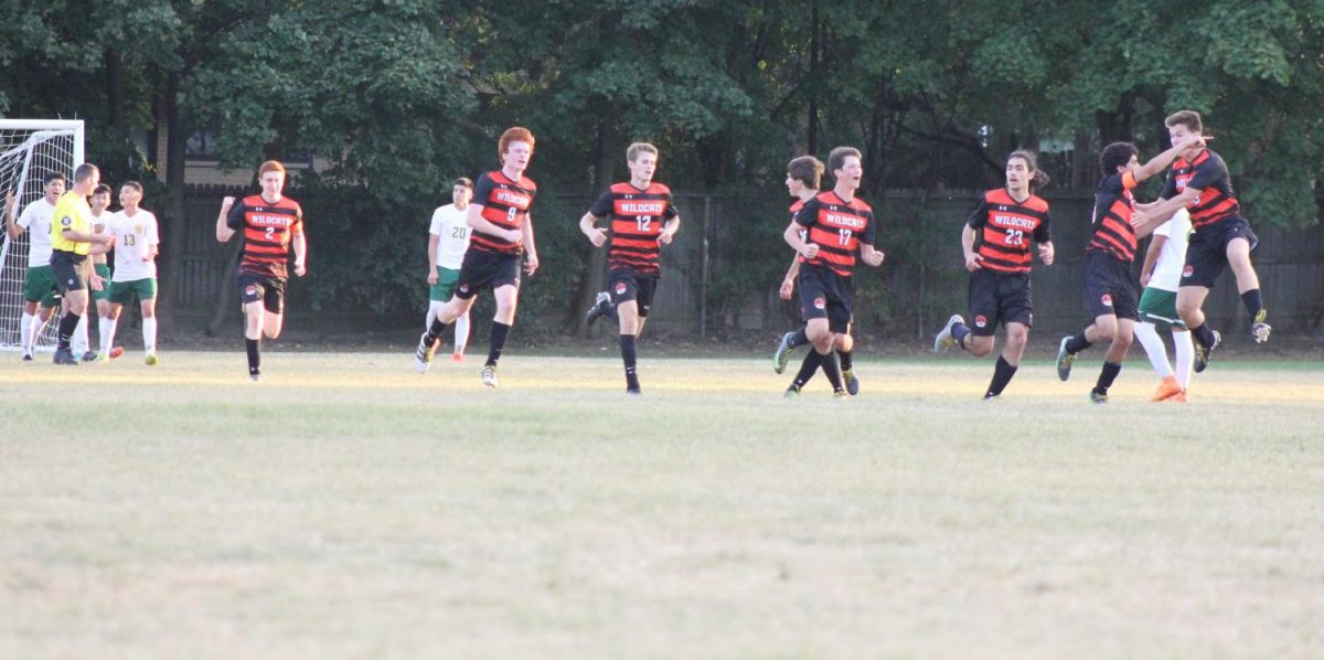 Libertyville+players+celebrate%2C+after+a+goal+by+Greg+Krokorian+in+the+second+half.