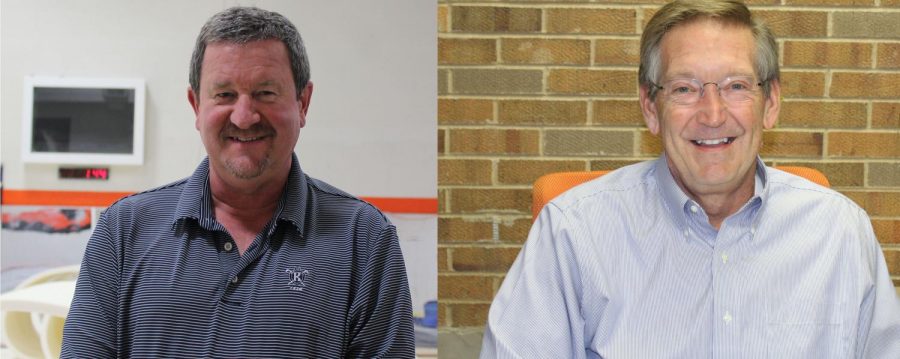 Mr. John Fischl and Mr. Randy Oberembt work to split up the job of an athletic director. 