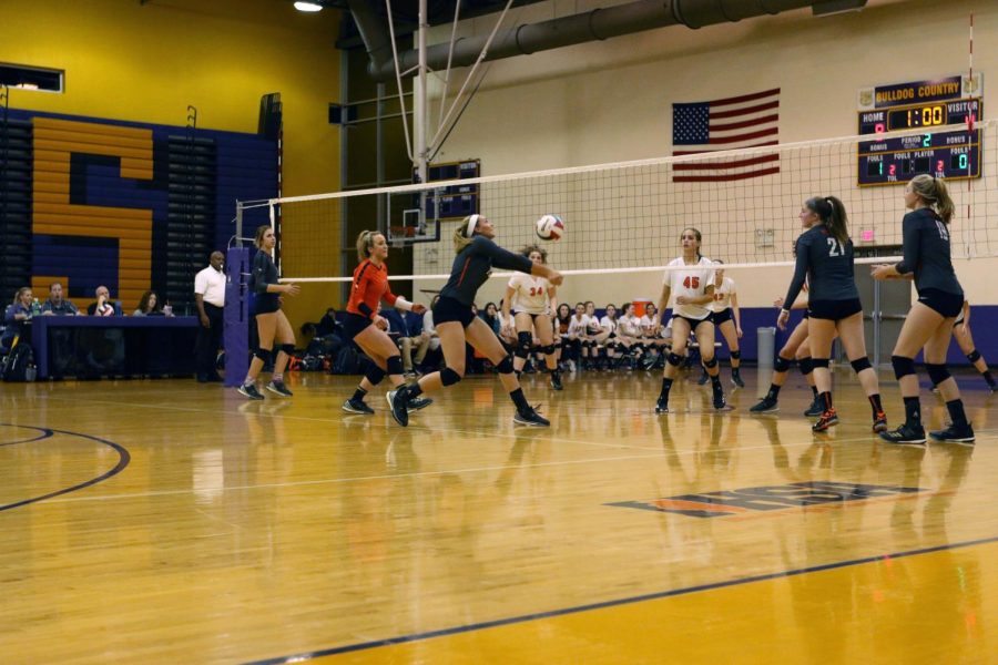 Senior Madi OBrien bumps the ball at the IHSA Sectional game against Crystal Lake Central. 