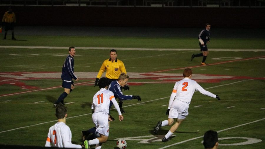 Senior Greg Krikorian (11) plays strong defense against the Wildkits.