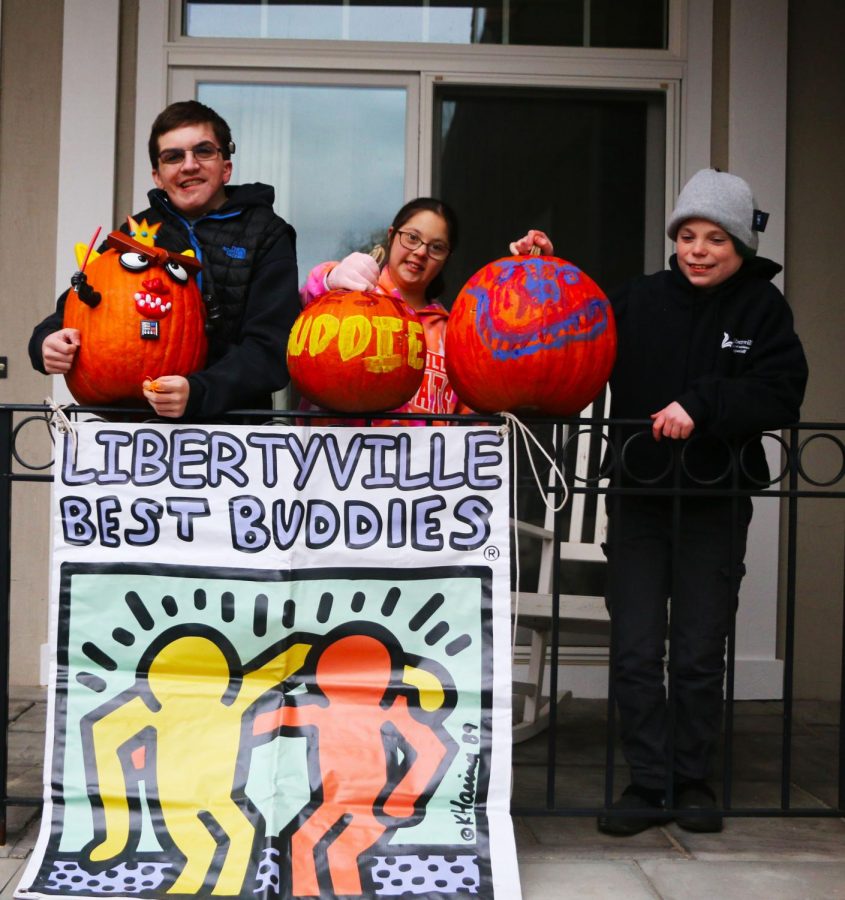 Peter Dankelson, Alexa Donato and Chase Miller attended the Best Buddies Halloween party and painted festive pumpkins on Oct. 28.