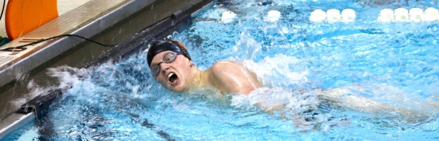 Libertyville senior Ben Sutter gasped for a breath after finishing second in the 500M freestyle with a time of 6:07.