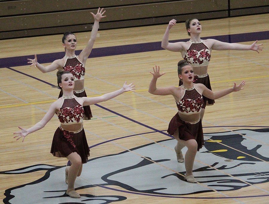 Sophomore Taylor Petz with juniors Becca Neil and Greta Dean group together their emotions along with senior Emily Stone.