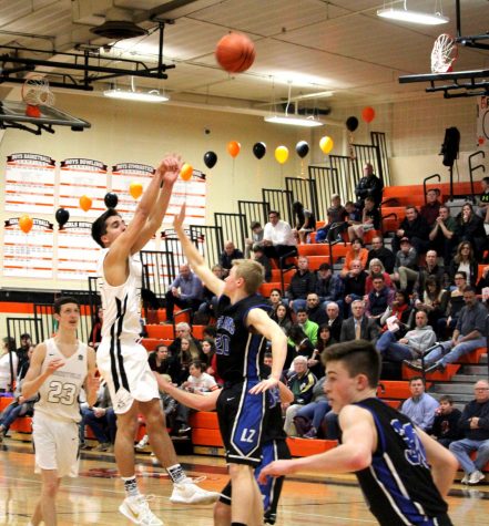 Boys basketball wins convincingly over Lake Zurich, extending winning streak to five