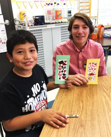 LHS students spent a school day in January with the elementary students from Mundelein learning about them in order to gain more information to finish their books.