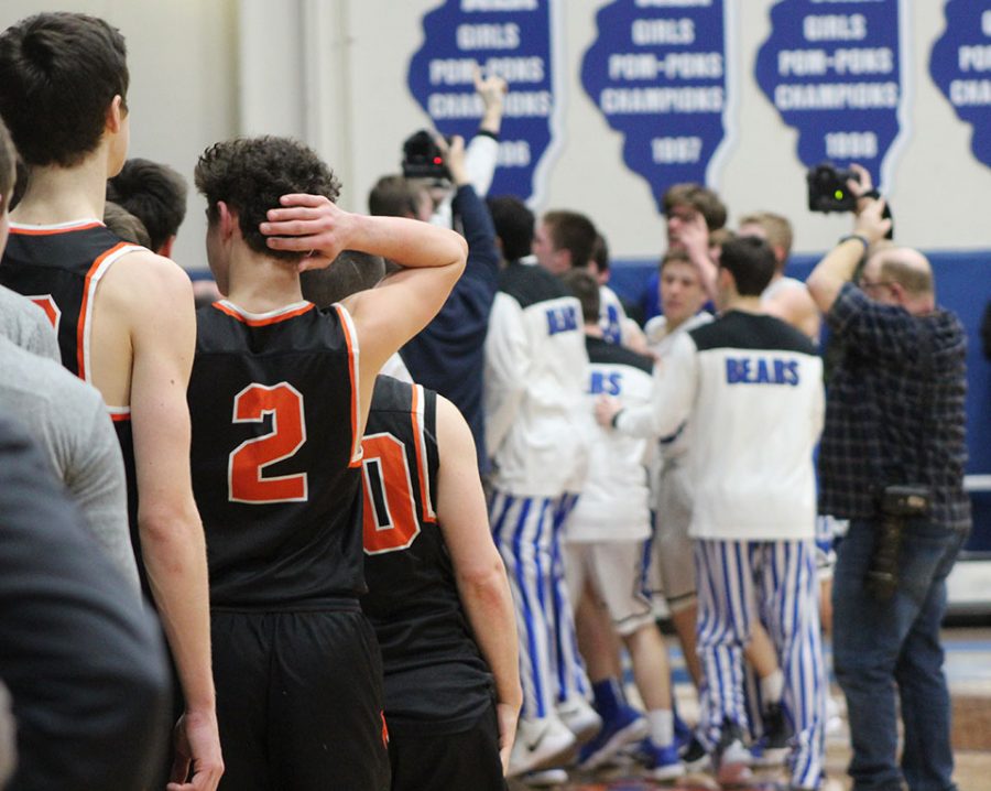 Libertyville lines up to shake hands after the game as Lake Zurich celebrates.