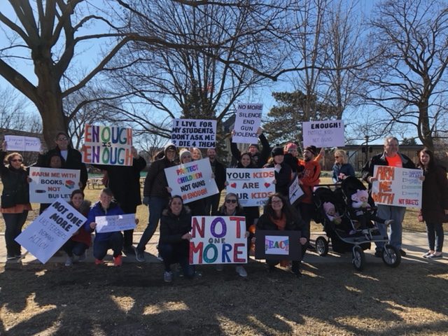 Teachers+and+their+families+lined+up+along+Milwuakee+Avenue+peacefully+protesting.