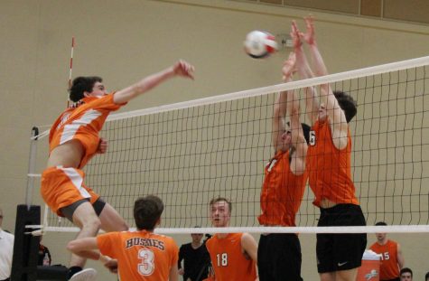 Varsity boys volleyball defeats Hersey