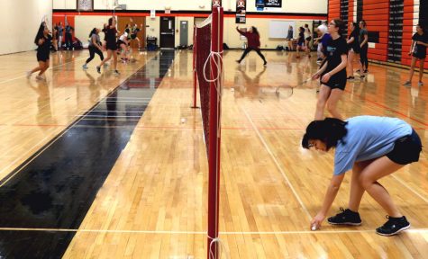 The LHS badminton team -- made up of exhibition, JV and varsity levels -- competes in doubles and singles matches, but all practice together in the Main Gym.