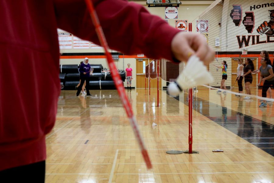 In badminton, the rules for serving required players to hit the shuttle below the waist and serve behind the line. The shuttle has to be hit back over the net in order for the point to count.