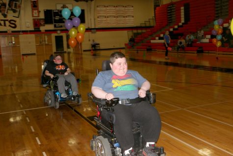 Juniors Brandon Fisher (front) and James Clavey (back) put on a high-speed race around a course set up of cones.