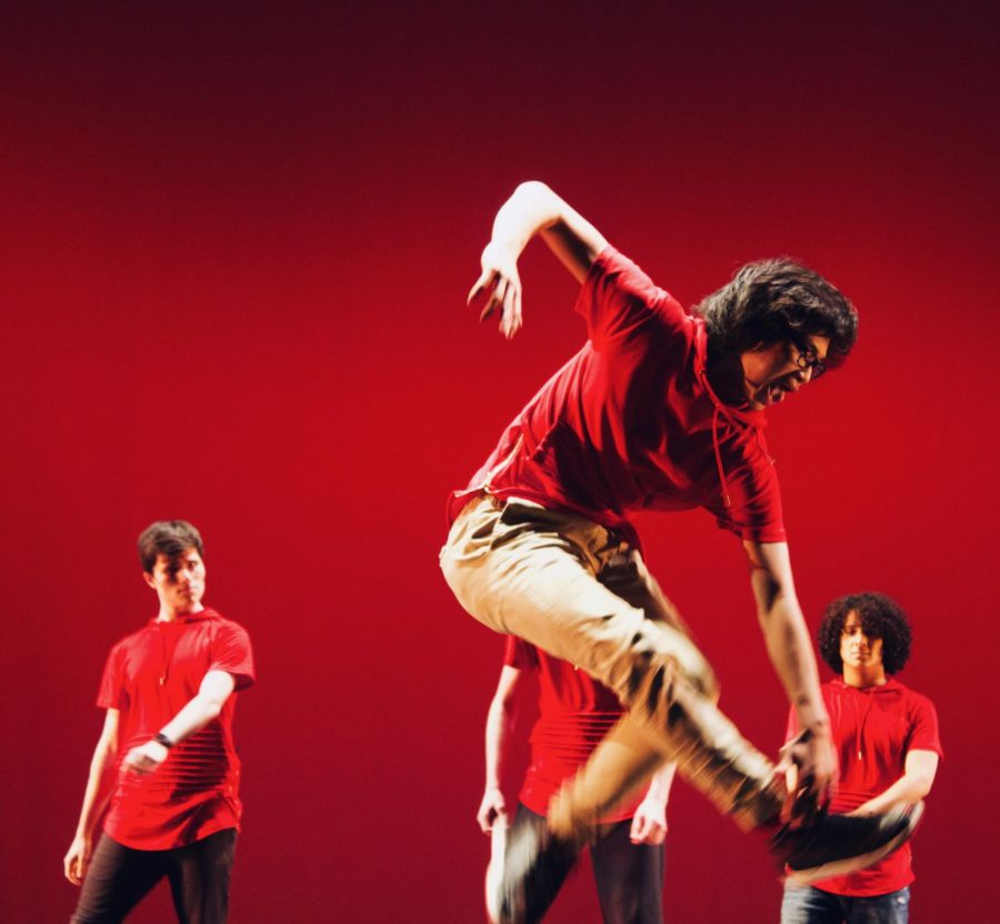 Junior EJ Chen performs a dance for Brochesis, the male group of Orchesis.