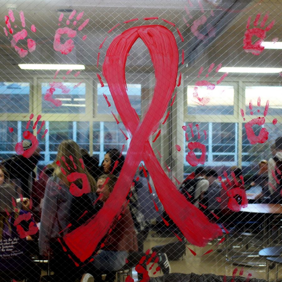 The red ribbons painted around the school reminded students throughout the week about the importance of being drug and alcohol free. The cafeteria windows, trophy case windows and library windows were all painted to show support for the campaign.