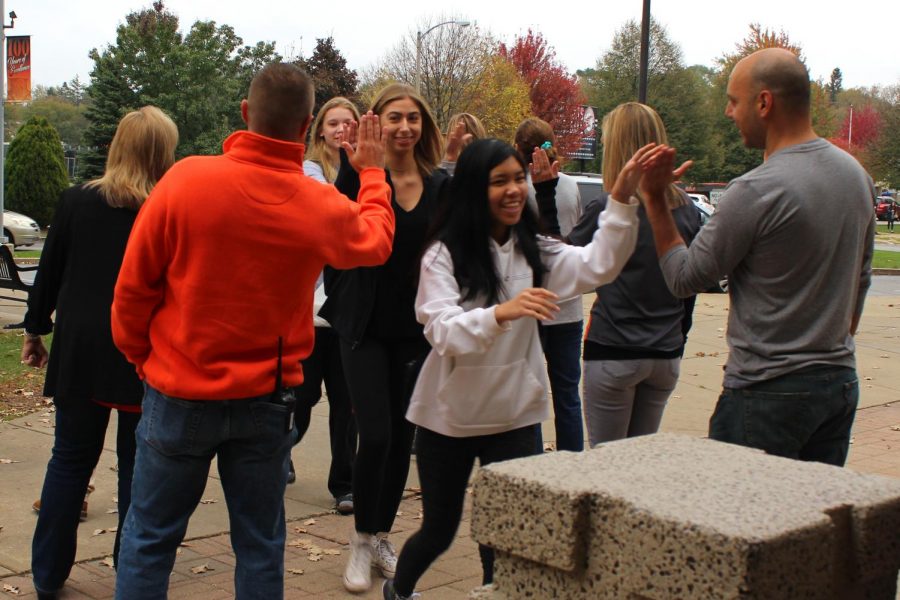 To start off the last day of Red Ribbon Week, on Friday, October 26, faculty and staff gathered outside the main entrance to high five students and wish them a happy Friday.