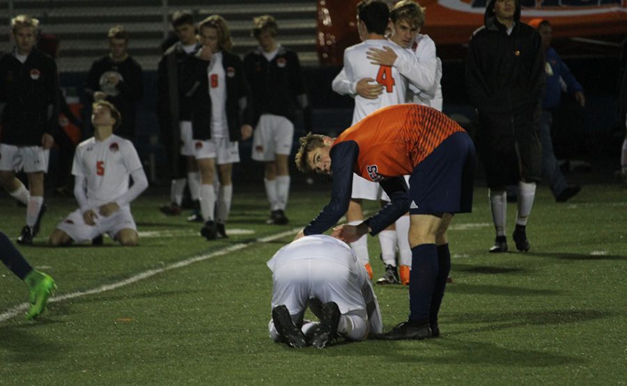 Their only loss of the season happening at the state title game, the Libertyville boys soccer team reacts to their loss against Naperville North on Saturday, Nov. 3. 