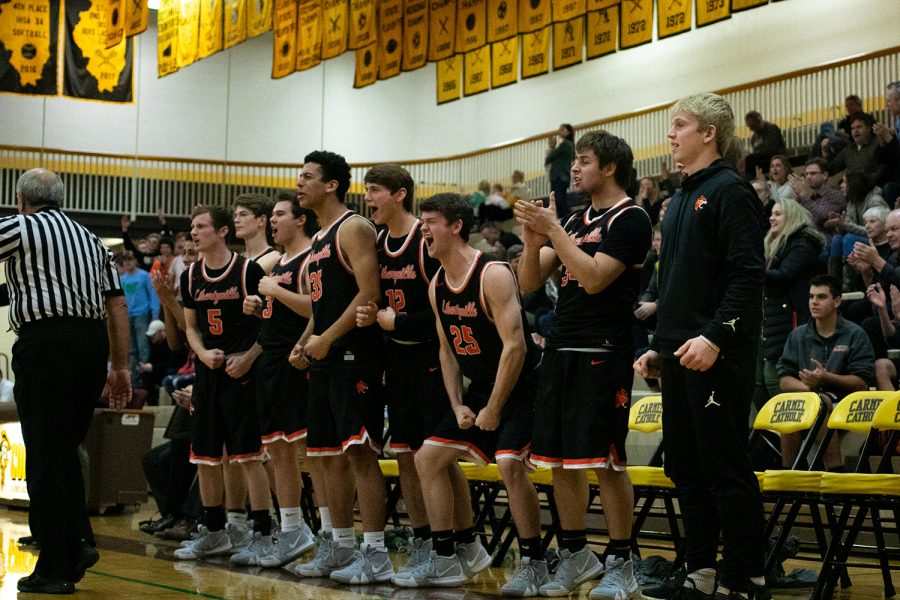 Keeping their teammates energized, the Wildcats’ bench got rowdy late into the game after a big play.