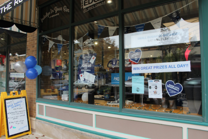 Most of the local businesses decorated the windows and entrances of their shops, like The Runner’s Edge, in support of the shop local day.