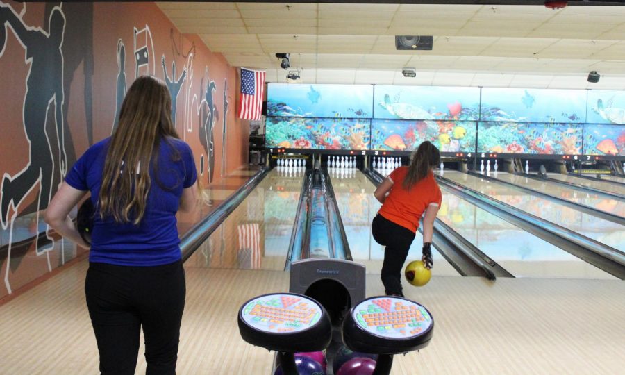 A Warren player waits while Felsl bowls. It is considered improper etiquette to bowl while another person is already bowling, so opponents take turns stepping up to the lane.