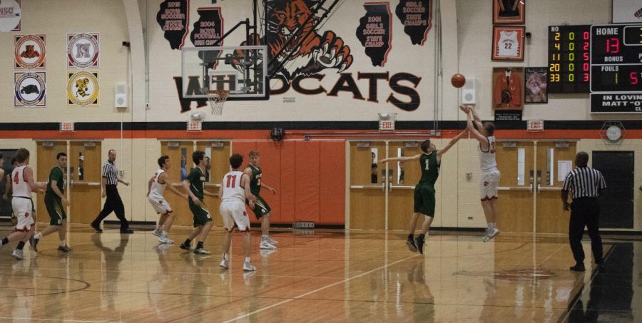 Junior Jackson Watson attempts a three-point shot in the first quarter.