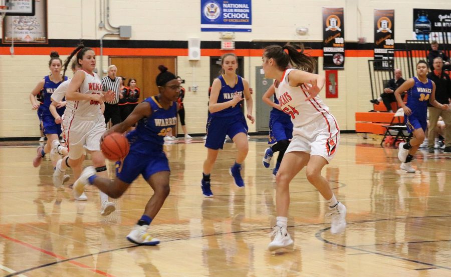#54, junior Abby Parkerson faces off with the score 35-45 Libertyville.