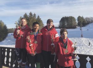 Kraus (far left) and some of her Wilmot teammates received awards after the last race of the year at Tyrol Basin in Wisconsin. They were awarded trophies for qualifying as overall point winners throughout the 2018 season.