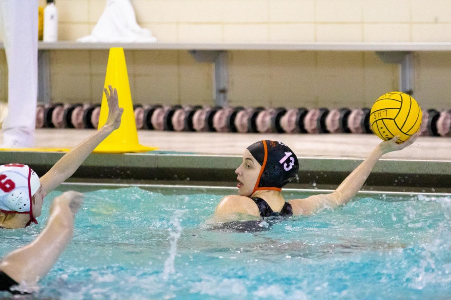 Juliana Lex scans the pool for passing options late in the fourth quarter.