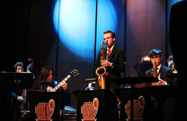 Jack Govern, junior, took a solo on the tenor saxophone. Also pictured are (from left) Nate Rezell on string bass, Thomas Power on guitar and Alex Tang on alto saxophone.