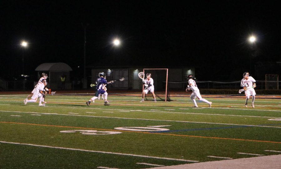 Wesley Hare readies to block a shot at the goal from Bartlett.