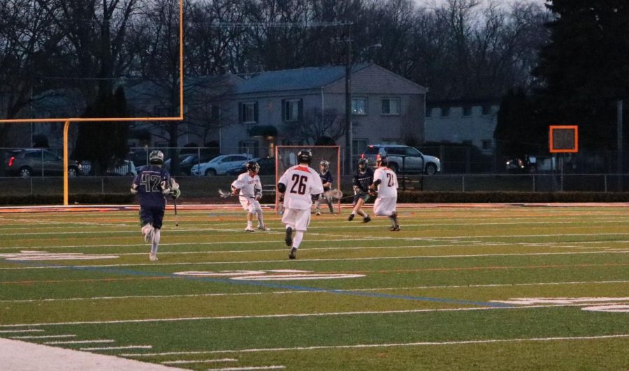 Junior Matthew Brenner scores the first goal for LHS in the first quarter.