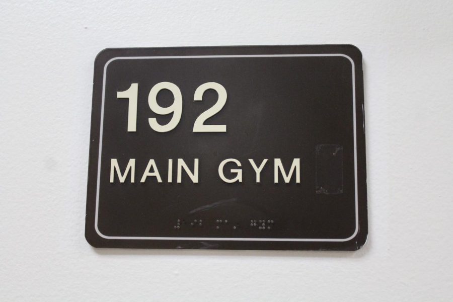 While the main gym was closed there were warning signs on all of the gym doors as well as wrestling mats in front of the doors to block the entrances.