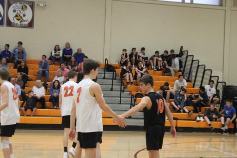 Cam Edmunds (10) encourages Patrick Graham after he scored a point.