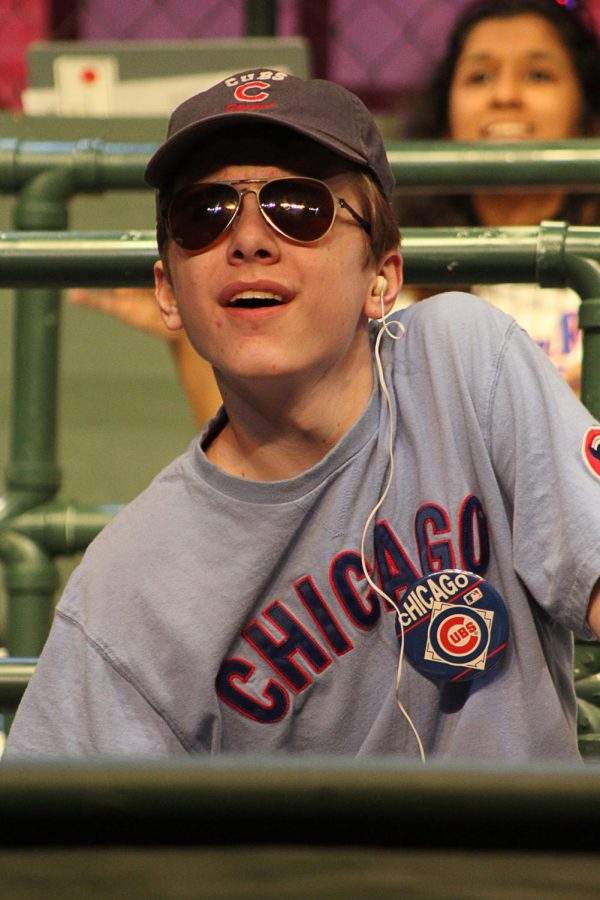 Gilbert Ferguson plays Greg, a blind Cubs fanatic who listens intently to the play by play of the game through a radio. 
