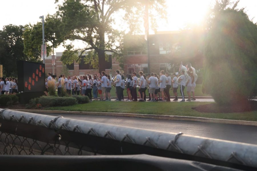 The Libertyville High School marching band gets ready to play on the march to Carmel.