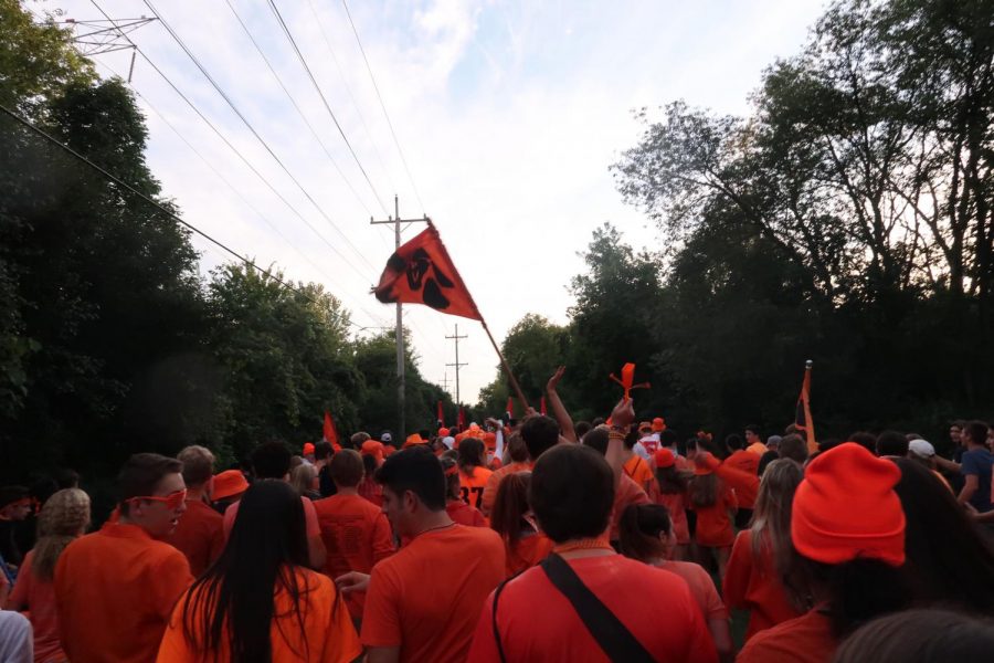 The majority of the student section radiated their school spirit for the orange-themed football game.