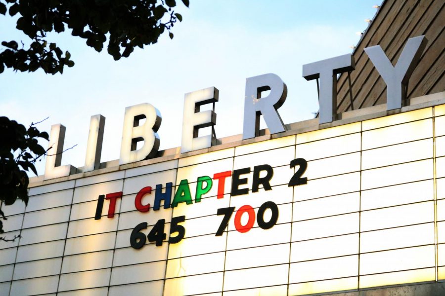 Above the Liberty Theater, people are able to see the movies that are currently being shown and their showtimes.