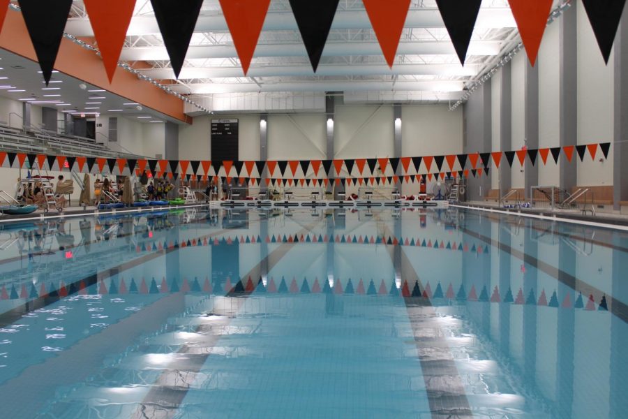 Three+black+and+orange+banners+span+the+eight+lanes+that+the+new+pool+boasts.+