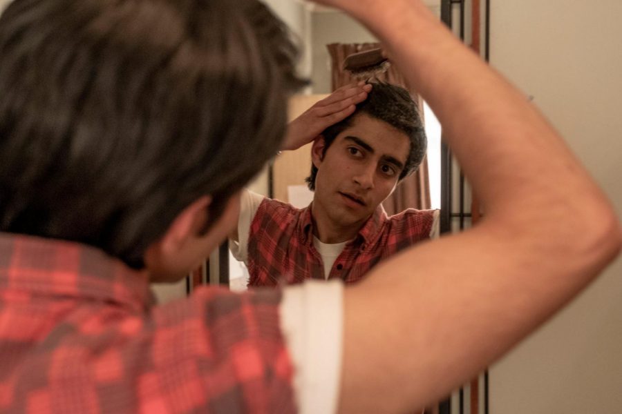 Viveik Kalra in “Blinded by the Light,” styling himself after his hero Bruce Springsteen (Nick Wall/Warner Bros.)