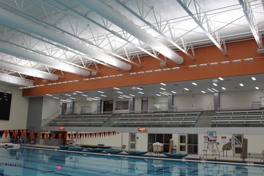 The new elevated viewing section of the pool which includes a back on the bleachers spans larger than the other pool and offers more viewing space and increased ways to enter and exit including an elevator.