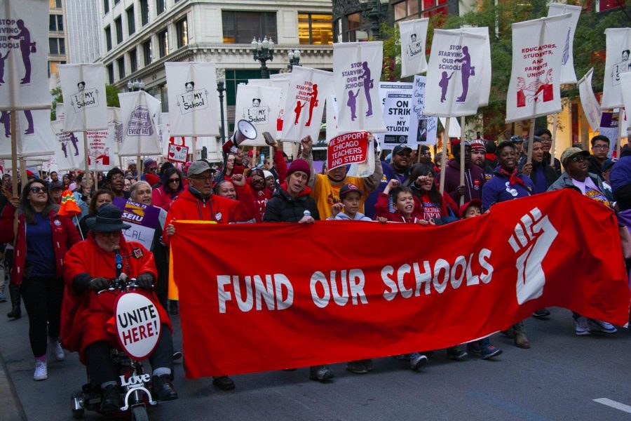 Members+of+the+Chicago+Teachers+Union+march+during+their+recent+strike.