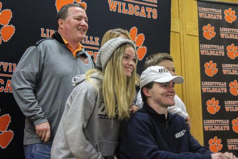 Sam Paden, a senior committed to University of Illinois Springfield for baseball, poses with his family after signing his letter. 