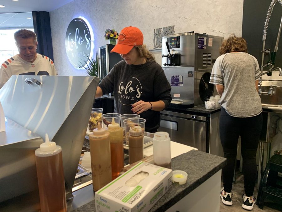Schick and her family work to make bowls for a busy Sunday morning crowd.