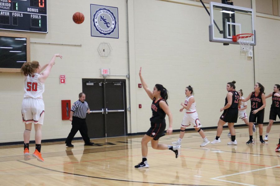 Senior Lydia Crow makes her second attempt at the three-point line, making the score 3-0 Wildcats.