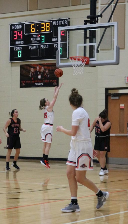 Abigail Frea makes her lay-up, putting the score at 36-12.