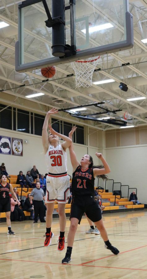 Kristina Kotzan makes her lay-up to give the Cats a 51-16 lead.