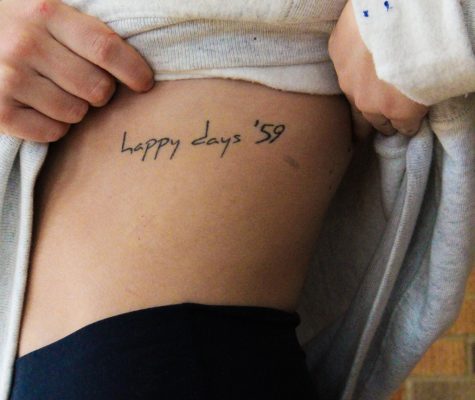 Senior Allie DeFranco has a tattoo that reads “happy days ‘59.” DeFranco’s. tattoo is a tribute to her grandfather and his love for cars.