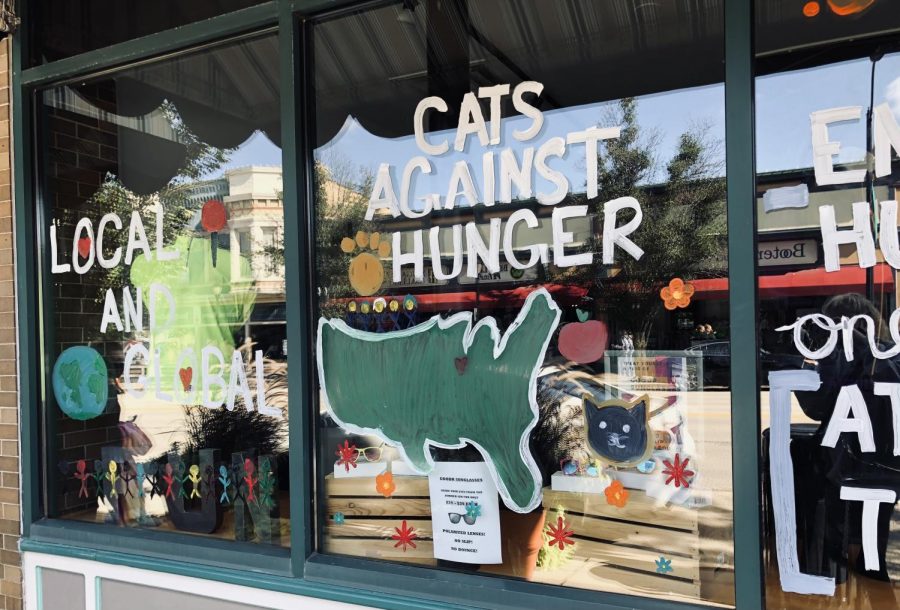 Cats Against Hunger painted their windows with their club’s message.