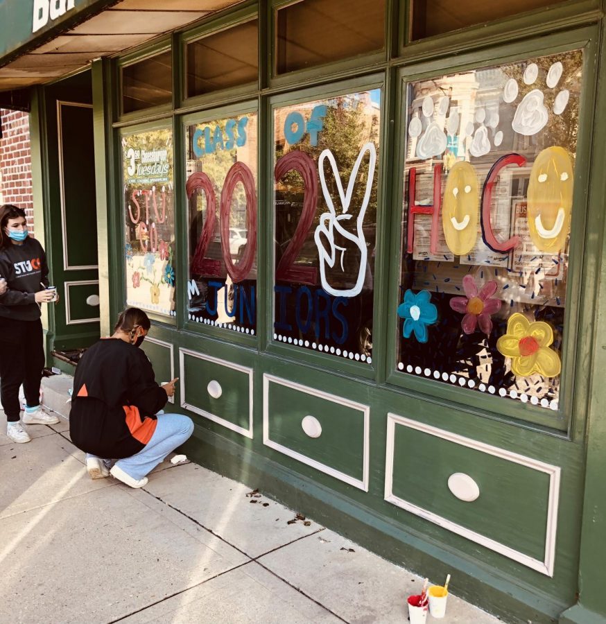 The junior class student council created an uplifting and light painting on their designated windows.