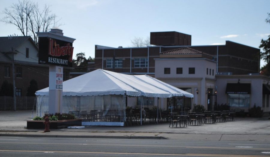 The Liberty Restaurant has drawn back many of their regular customers with abundant outdoor seating. They utilized their large parking lot to create this new space.